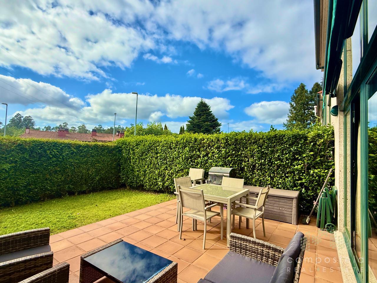Terraza y jardín de vivienda