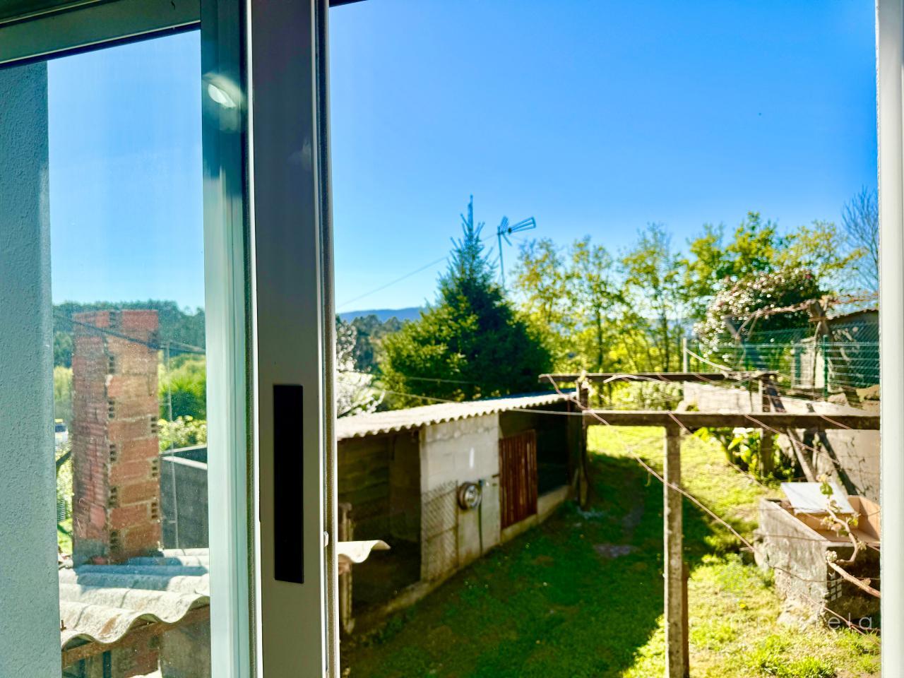 Vistas desde estancias hacia parcela de atrás