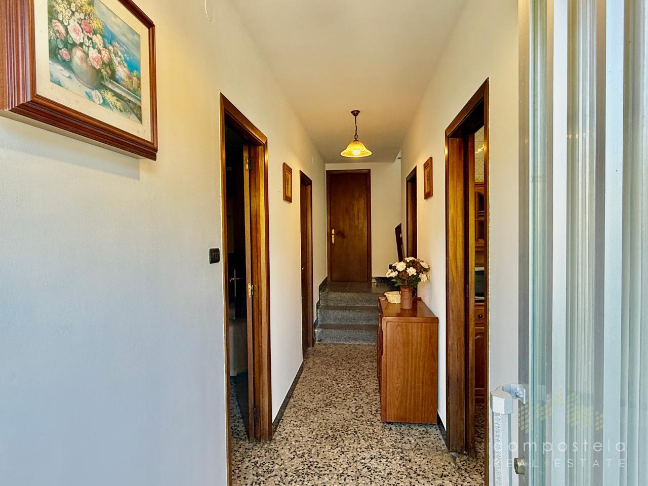 Hall, planta baja de vivienda