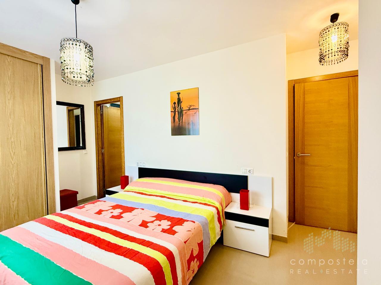 Dormitorio principal con baño y armario empotrado