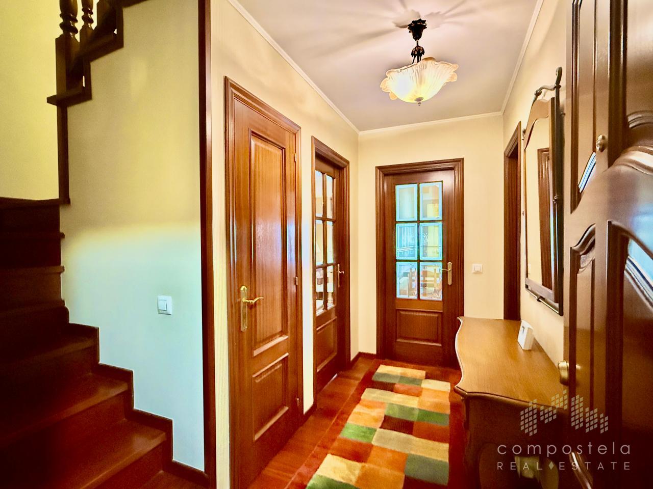 Acogedor hall en planta baja